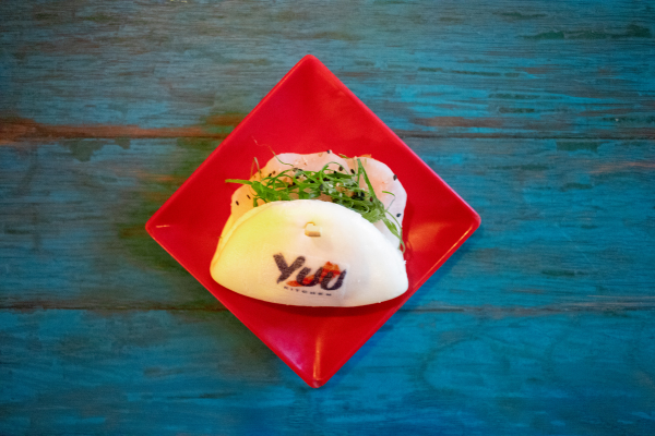 a boa bun with th brand Yuu on it